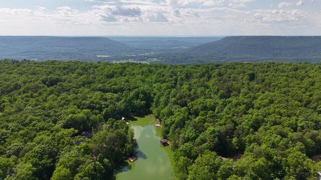 High Altitude Drone Panorama of Appalachian Mountain Valley Lake and Forest Menlo Georgia