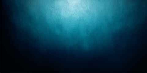 Obraz premium A dark blue grunge background with rays features a vintage textured wall pattern and aged concrete surface for an old dirty paper material design