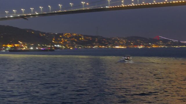 Yellow and Red 15 July Martyrs Bridge Night Lights Drone Video, Kuzguncuk Beylerbeyi District Uskudar, Istanbul Turkiye (Turkey)
