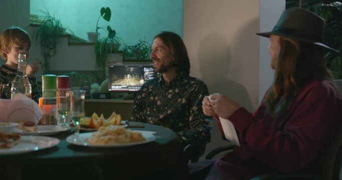 Kid Spend Time with Uncles. Friends Have a Home Party Dinner. 4K 10-bit