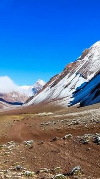 Aconcagua, a mountain in the Andes Mountains between Chile and Argentina. Time lapse in vertical video
