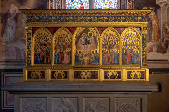 Florence, Italy - 17 Sep 24: Gilded altarpiece inside Santa Croce Basilica, Florence