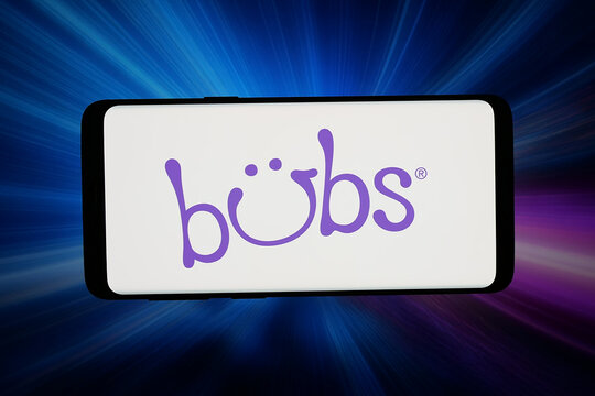 Stuttgart, Germany - 05-13-2026: In this photo illustration, the logo of infant nutrition company Bubs Australia Ltd. is displayed on a smartphone in front of abstract background on computer screen.