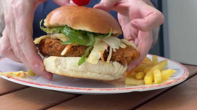 Serving a Crispy Chicken Sandwich with French Fries