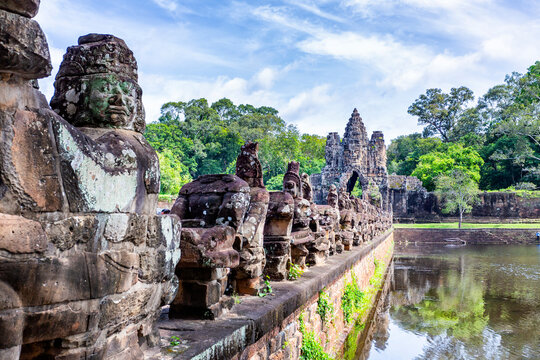 Stone statues leading to Angkor Thom gate