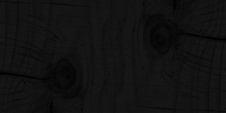 Black charred wood texture background with natural organic grain and knots, dark burnt timber shou sugi ban surface