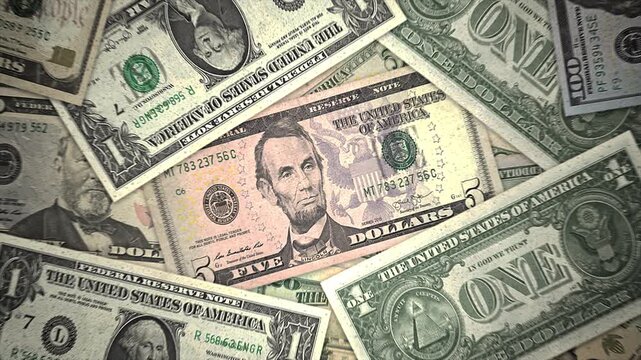 Stop Motion of US Dollar bills banknotes. five Dollars on close-up. Finance Business concept animation.