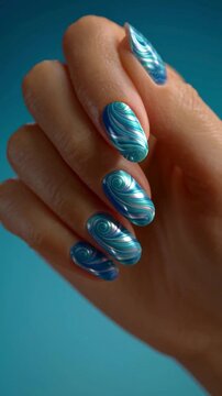 Blue shell nail art manicure, Metallic sea inspired nails, Long almond beauty design, Hand model on turquoise background, Selective focus