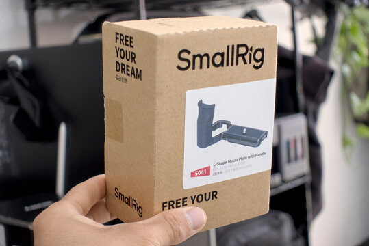 Zapopan Jalisco, Mexico - May15 2026: Hand holding SmallRig L-shape mount plate box, camera accessory concept