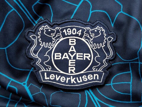 Photo of the embroidered emblem of Bayer 04 Leverkusen on the 2023&ndash;2024 special kit. Bayer Leverkusen is a German professional football club based in Leverkusen, North Rhine- Westphalia.