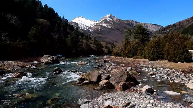 The Bujaruelo Valley, through which the Ara River flows, along with the mountains, the melting snow of the Aragonese Pyrenees, Ordesa y Monte Perdido National Park, the Pyrenees, Huesca, 
