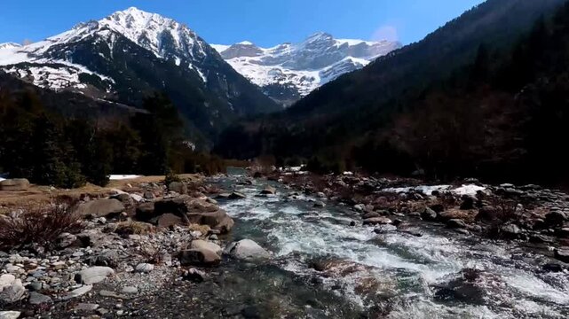 The Bujaruelo Valley, through which the Ara River flows, along with the mountains, the melting snow of the Aragonese Pyrenees, Ordesa y Monte Perdido National Park, the Pyrenees, Huesca, 
