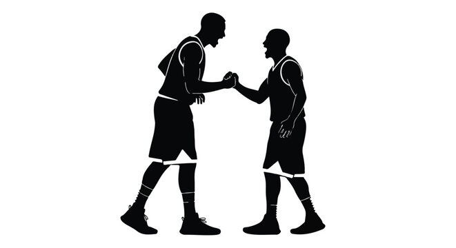 Two basketball players bumping fists in silhouette
