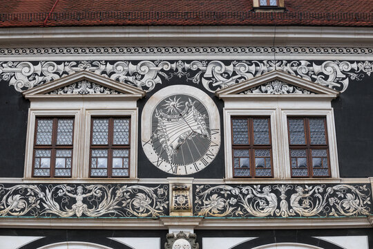 Cityscape - view of the exterior of the Long Corridor with sundial and sgraffito painting in the Eastern courtyard of Dresden Castle, Saxony, Germany