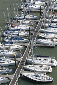 Sailing boats moored along jetty, River Tagus, Lisbon, Lisboa Region, Portugal