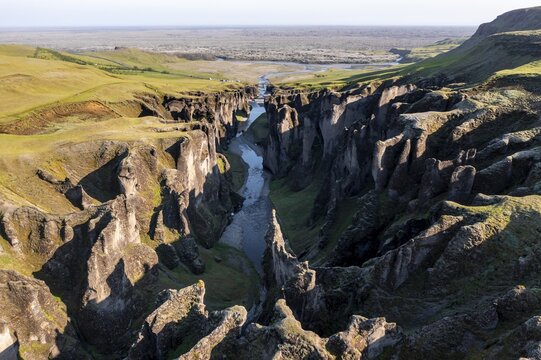 Aerial view of Fja&eth;r&aacute;rglj&uacute;fur Canyon, deep gorge, tufa rock, near Kirkjubaer on the south coast, South Iceland, Iceland