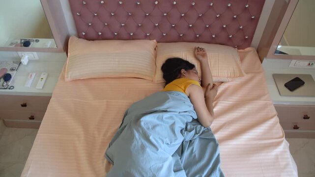 Indian Woman Suffering from Insomnia Lying Awake in Bed, Unable to Sleep at Night, Uncomfort sleeping