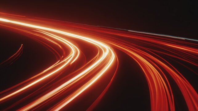 Speed of Light: Abstract streaks of vibrant orange light curve and flow against a dark background, symbolizing rapid motion and energy.