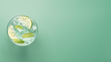 Minimal mojito banner with copy space and pastel green background © hannamartysheva
