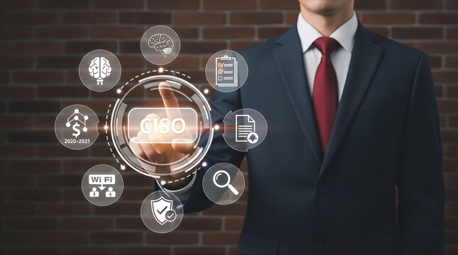 Business executive in dark suit pointing at virtual ciso icon representing chief information security officer role with various cyber security and data protection symbols on modern digital interface