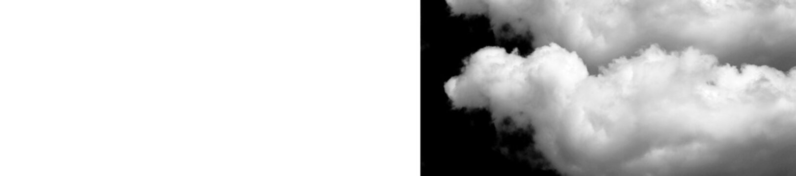 White fluffy clouds on dark night sky background