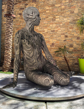 Palm Springs, California, USA - April 14, 2026: Isabelle statue, famous for its &ldquo;sliced&rdquo; construction, by Julian Voss-Andreae, near Palm Springs Art Museum in shopping mall. From some angles, it looks