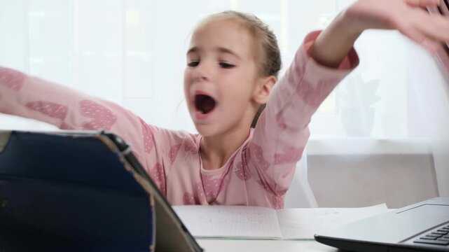 Child learning alone at home hybrid education with digital tools
