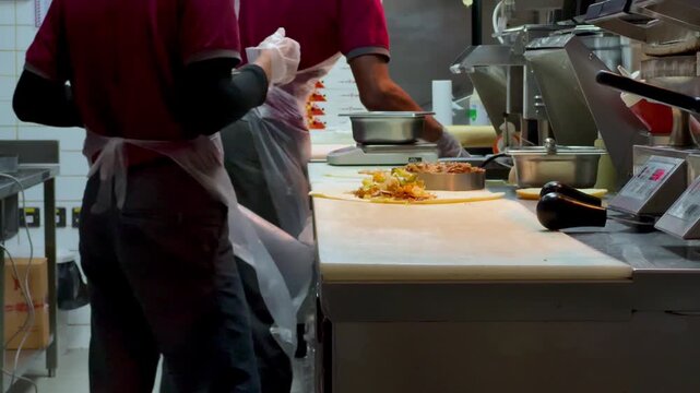 Chef Preparing Fresh Shawarma Wrap in Kitchen