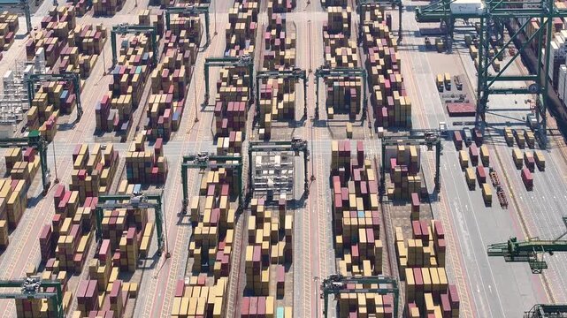 Global supply chain disruptions visible in shipping congestion and container backlog at major port facility
