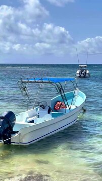 Tropical Paradise: Boats Anchored in the Turquoise Waters of Akumal, Mexico