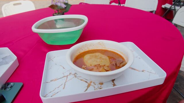 Traditional ghanaian fufu with groundnut soup, popular african cuisine in Accra, showing authentic west african culinary experience with delicious local specialty meal