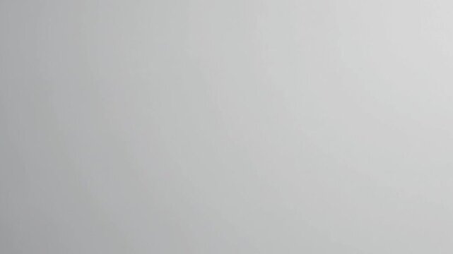 White Paper Surface Unrolling Across Dark Background Seamless Loop Video Backdrop for Presentation