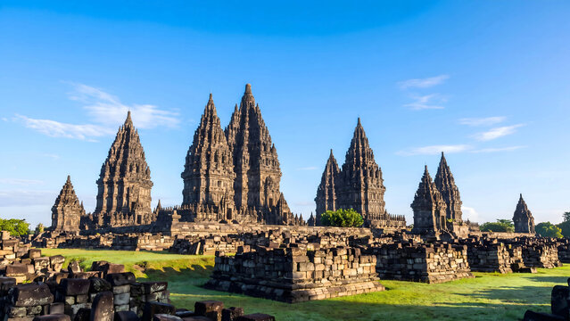 Prambanan temple complex towers under blue sky