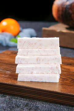 Fresh Lipu Taro Slices from Guangxi China on Wooden Board - Traditional Asian Root Vegetable Ingredient