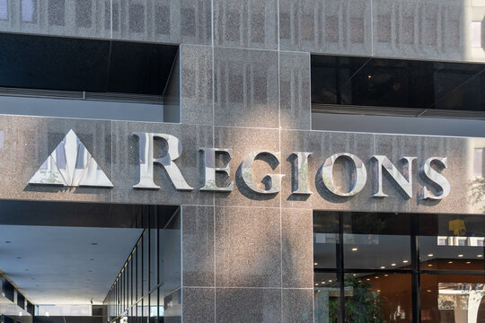 New Orleans, Louisiana, USA - February 12, 2022: Close up of  Regions Bank sign on the building in New Orleans, Louisiana, USA. 