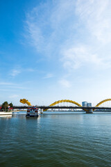 Fototapeta premium Dragon bridge over Han river in Danang, Vietnam. A famous landmark in Da Nang.