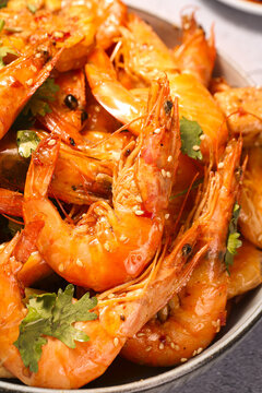Spicy Gourmet Shrimp with Herbs and Sesame Seeds in Cooking Pot - Homemade Seafood Meal