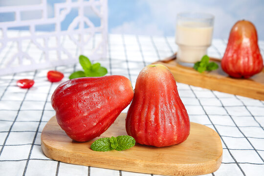 Fresh Red Wax Apples Rose Apples on Wooden Board with Mint Kitchen Food Photography