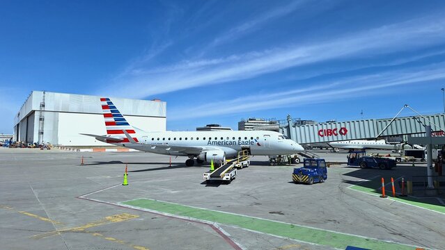 American Eagle airplane at Toronto Pearson International Airport gate.