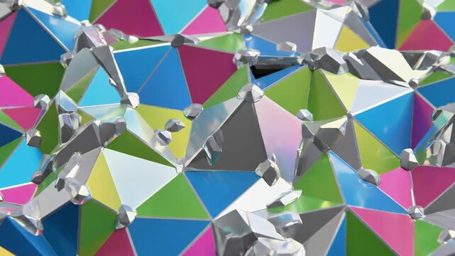 A colorful geometric pattern of shiny triangular facets in blue, green, pink, and silver hues