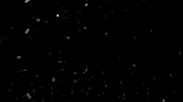 Slow motion heavy debris dust particles swirling and falling gently on a dark black background