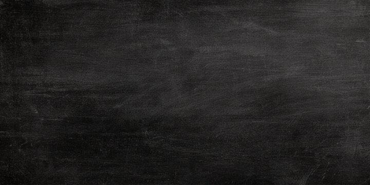 Dark gray wall scratched blackboard texture with empty space for writing or drawing