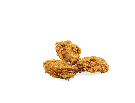 Three pieces of crispy fried chicken On Transparent Background, isolated with copy space. Golden crunchy breading, fast food and comfort meal concept.