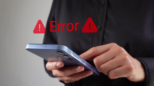 Executive woman working on her cell phone with an animated "Error" message and warning signs. Warning of a computer error.