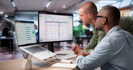 HR Manager Uses Digital Software To Track Employee Performance © Andrey Popov