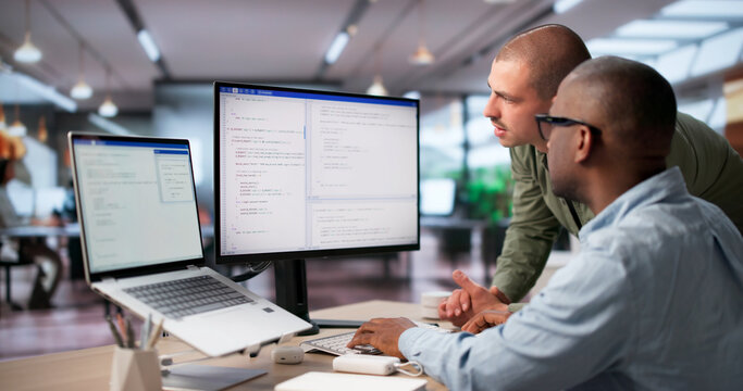 Two Software Engineers Collaborate On Secure Coding