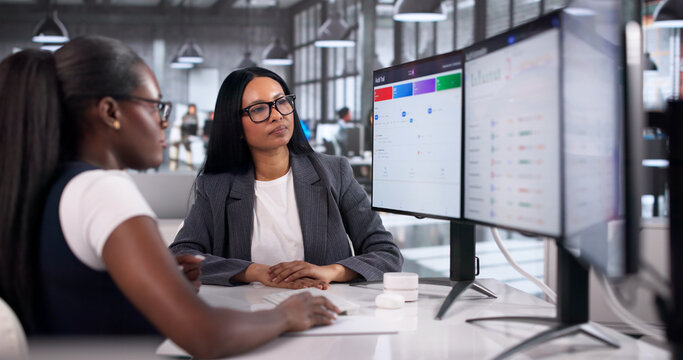 Internal Auditor Woman Carefully Reviews Computer Logs