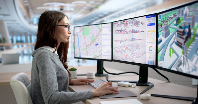 Young Female Engineer Studies 3D BIM Model