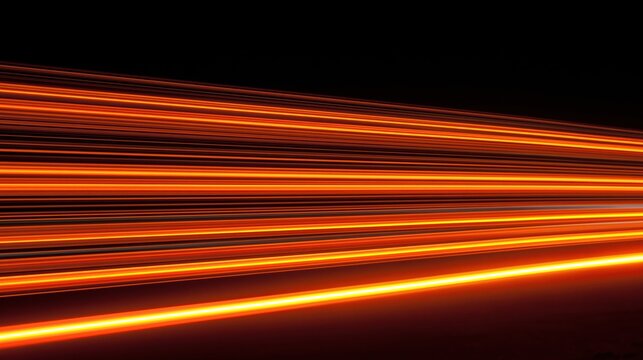 Abstract flowing orange light streaks in motion, representing speed, technology, and data transfer