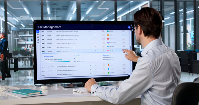 Older Man Uses Touchscreen Computer Analyzing Financial Data